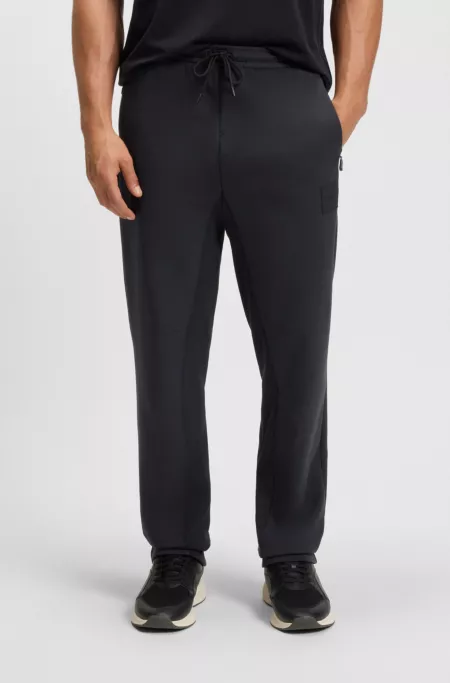 Cotton-blend tracksuit bottoms with stretch