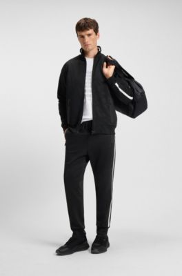 Relaxed-fit tracksuit bottoms with jacquard-woven circles, Black