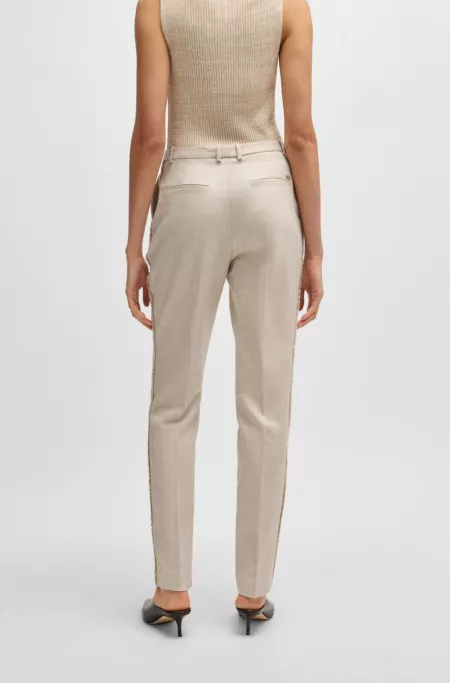 Relaxed-fit trousers in melange stretch fabric