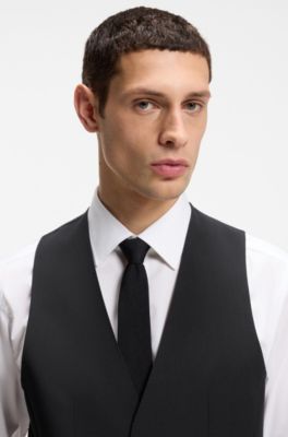 Slim-fit waistcoat in virgin wool with logo pattern, Black