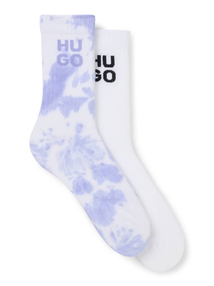 Artikel klicken und genauer betrachten! - Die HUGO Socken mit Stack-Logo an den Bündchen sorgen an allen Tagen für eine sportive Note. Kurze Länge mit gerippten Bündchen und weicher Sohle. | im Online Shop kaufen