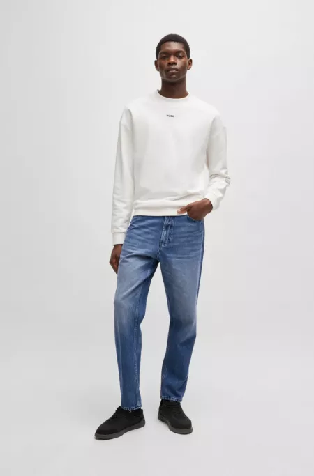 Relaxed tapered-fit jeans in blue vintage-wash denim