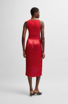 Strickkleid mit einem schimmernden strukturierten Rock , Rot