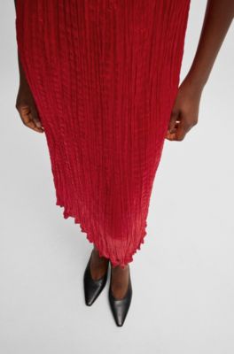 Strickkleid mit einem schimmernden strukturierten Rock , Rot