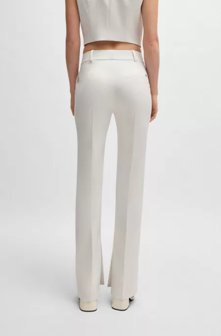 Slim-fit trousers in shimmer fabric