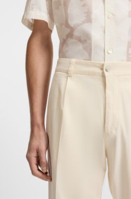 Tapered-fit trousers in stretch twill, Natural