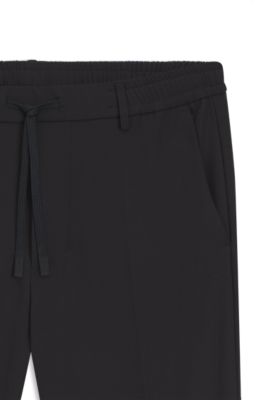 Tapered-fit trousers with water-repellent finish, Black