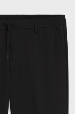 Tapered-fit trousers with water-repellent finish, Black