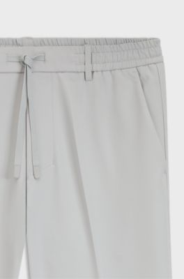 Tapered-fit trousers with water-repellent finish, Light Grey