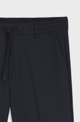 Tapered-fit trousers with water-repellent finish, Dark Blue