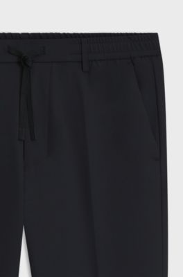 Tapered-fit trousers with water-repellent finish, Dark Blue