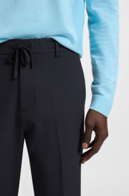 Tapered-fit trousers with water-repellent finish, Dark Blue