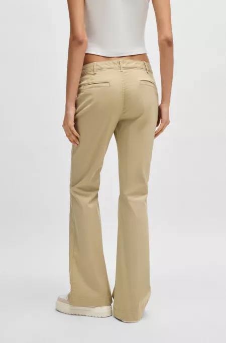 Flared-leg trousers in stretch cotton