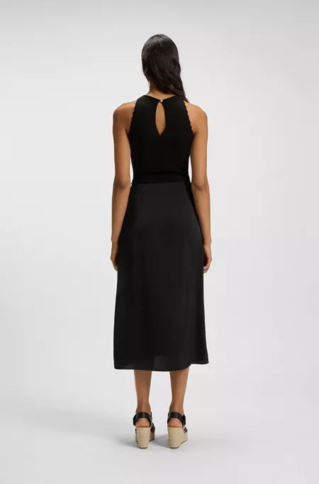 Knitted dress with contrast-fabric skirt