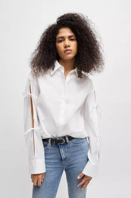 Oversized-fit cotton blouse with sleeve bows