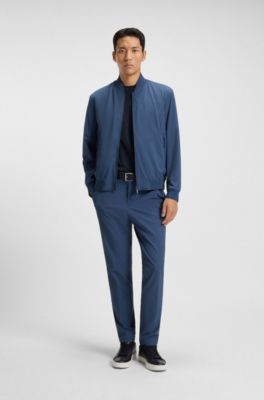 Slim-fit trousers in travel-friendly stretch softshell fabric, Blue