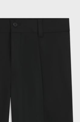 Pantalones de corte moderno en sarga el&aacute;stica con raya delantera, Negro