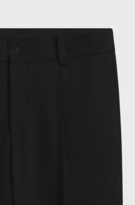 Pantaloni con fit moderno in twill elasticizzato con piega sulla parte anteriore, Nero
