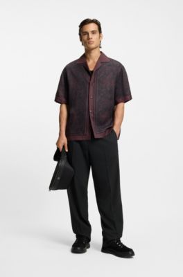 Pantalones de corte moderno en sarga el&aacute;stica con raya delantera, Negro