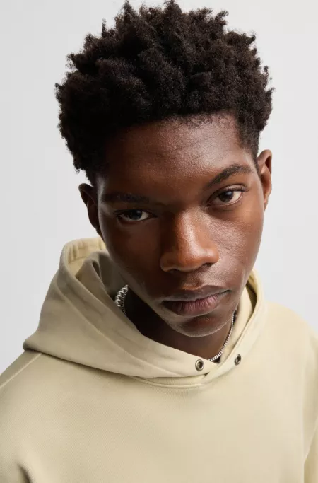 Cotton-terry hoodie with vintage eyelets