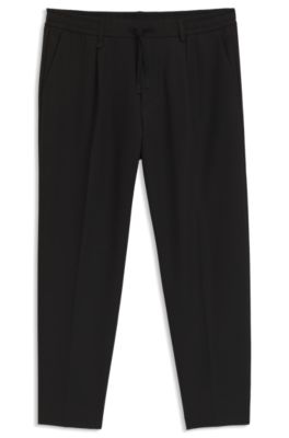 Tapered-fit trousers in water-repellent stretch fabric, Black