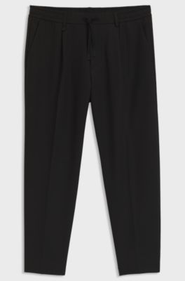 Tapered-fit trousers in water-repellent stretch fabric, Black