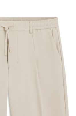 Tapered-fit trousers in water-repellent stretch fabric, Light Beige