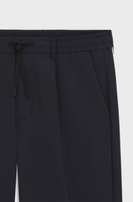 Tapered-fit trousers in water-repellent stretch fabric, Dark Blue