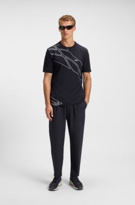 Tapered-fit trousers in water-repellent stretch fabric, Dark Blue