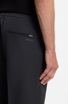 Tapered-fit trousers in water-repellent stretch fabric, Dark Blue