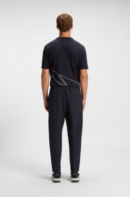 Tapered-fit trousers in water-repellent stretch fabric, Dark Blue