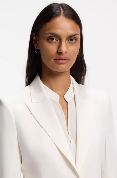 Slim-fit blazer with single-button closure
