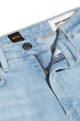 Jeans bootcut in denim elasticizzato blu con spacchi sugli orli, Celeste