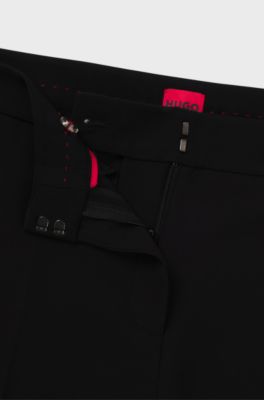 Slim-fit trousers in stretch fabric with logo rivet, Black
