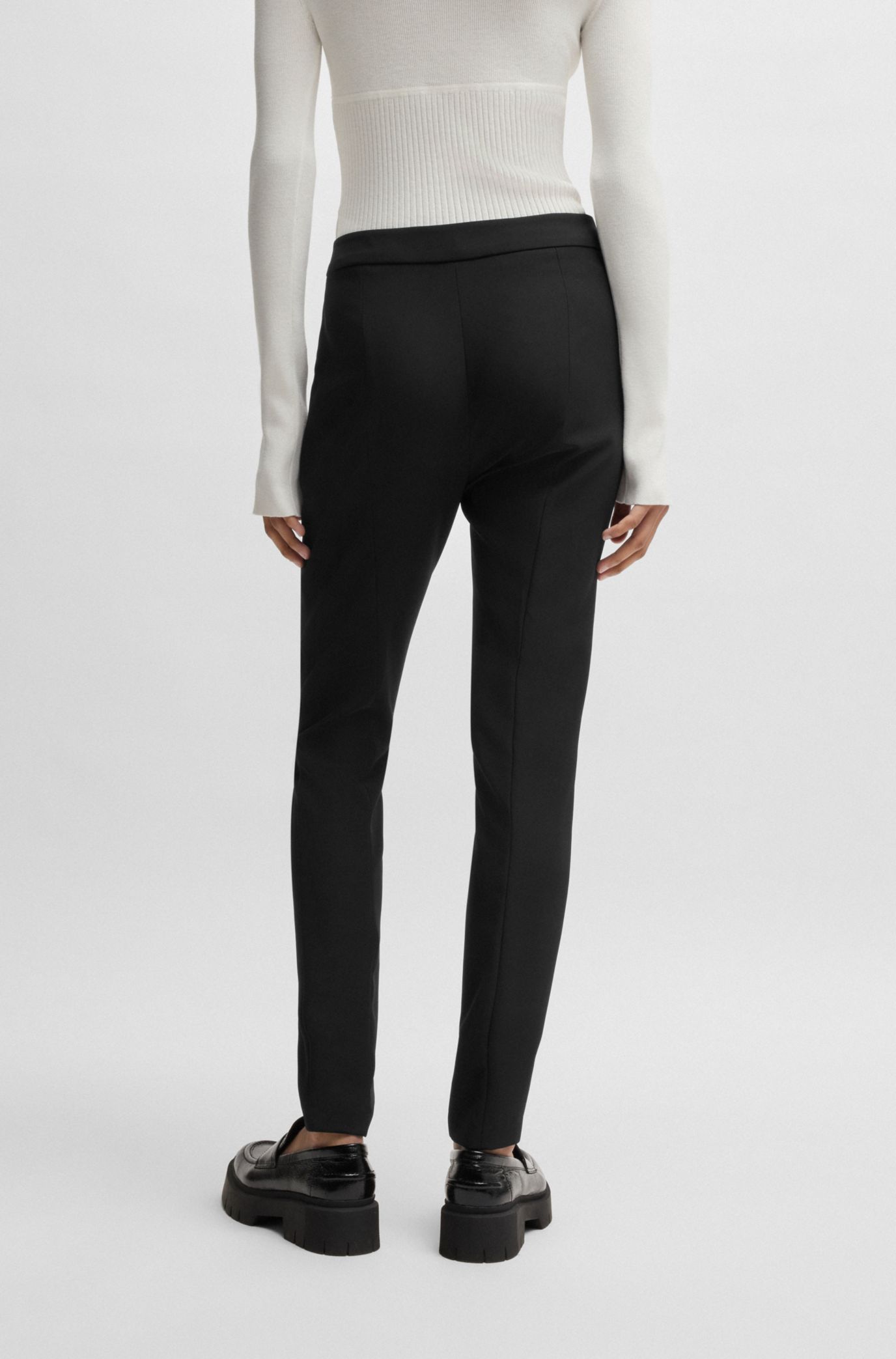 Slim-fit trousers in stretch fabric with logo rivet, Black