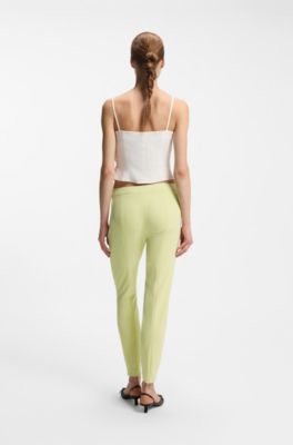 Slim-fit trousers in stretch fabric with logo rivet, Light Yellow