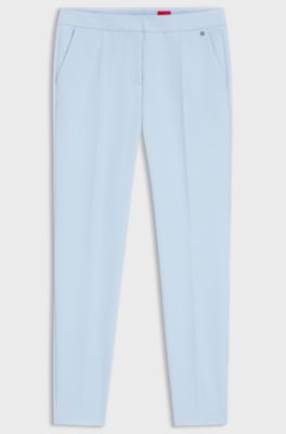 Pantaloni slim fit in tessuto elasticizzato con rivetto con logo, Celeste