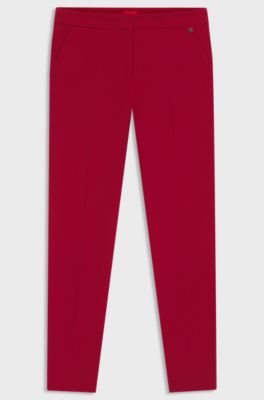 Pantaloni slim fit in tessuto elasticizzato con rivetto con logo, Rosso