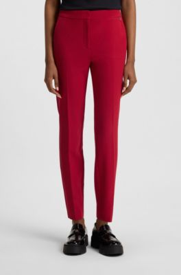 Pantaloni slim fit in tessuto elasticizzato con rivetto con logo, Rosso