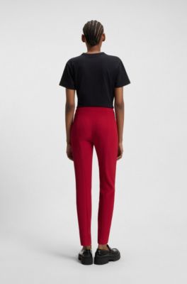 Pantaloni slim fit in tessuto elasticizzato con rivetto con logo, Rosso