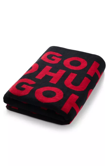 Cotton-terry beach towel with logo pattern