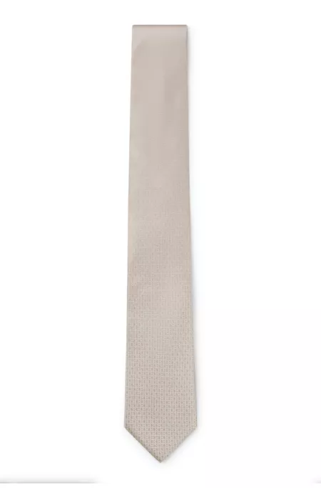 Silk tie with micro monograms