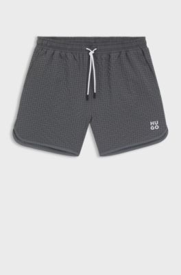 Waffle-structured swim shorts with embroidered stacked logo, Grey
