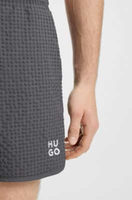 Waffle-structured swim shorts with embroidered stacked logo, Grey