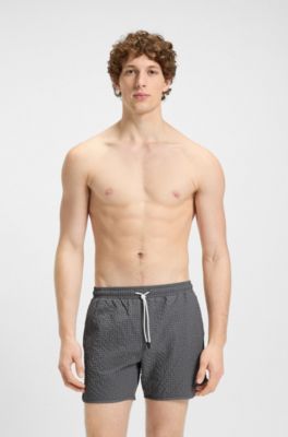 Waffle-structured swim shorts with embroidered stacked logo, Grey