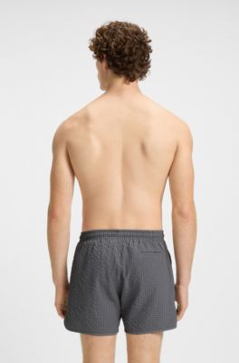 Waffle-structured swim shorts with embroidered stacked logo, Grey