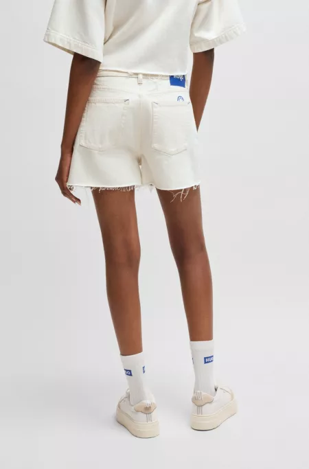 Ecru denim shorts with raw hem