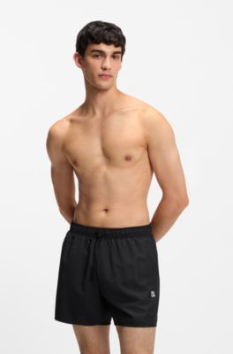 Set mit Badeshorts, Badetuch und Tasche, Schwarz