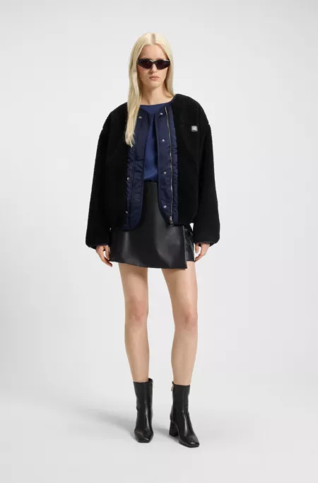 Veste réversible en peluche et tissu déperlant