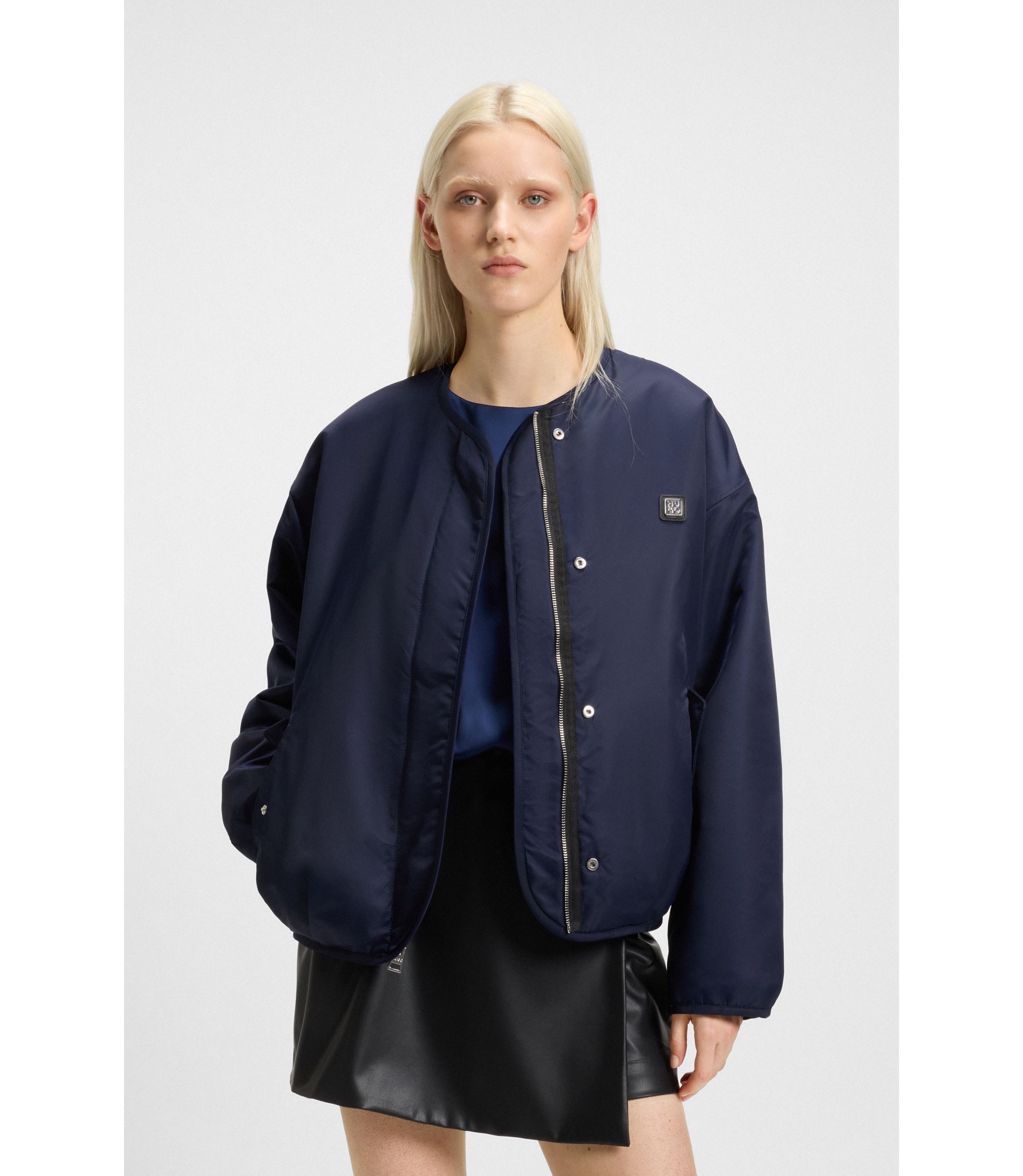 Wendejacke aus wasserabweisendem und Teddy-Gewebe